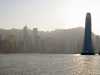 hong-kong - panorama-with-sun-behind-ifc-two-tower