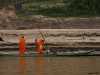 monks travelling mekong laos