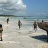 Zanzibari children running on the beach