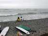 surfers at miraflores beach peru
